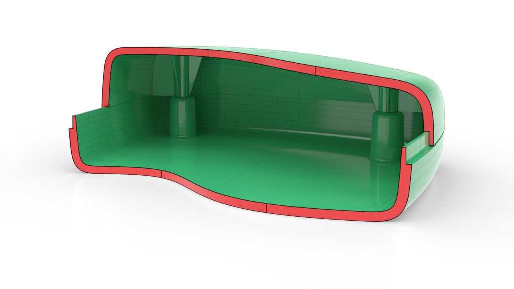 We see the cross section of a 3d modelled object. The item is coloured green and the edges that are exposed and closest to us are marked in red.
