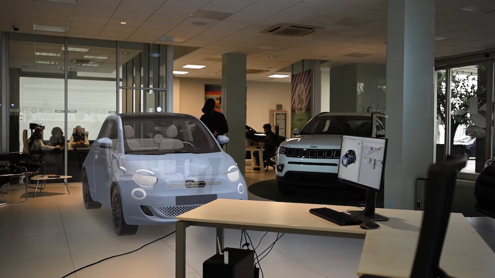 Mindesk simulation showing a car showroom with a white car added in Virtual Reality